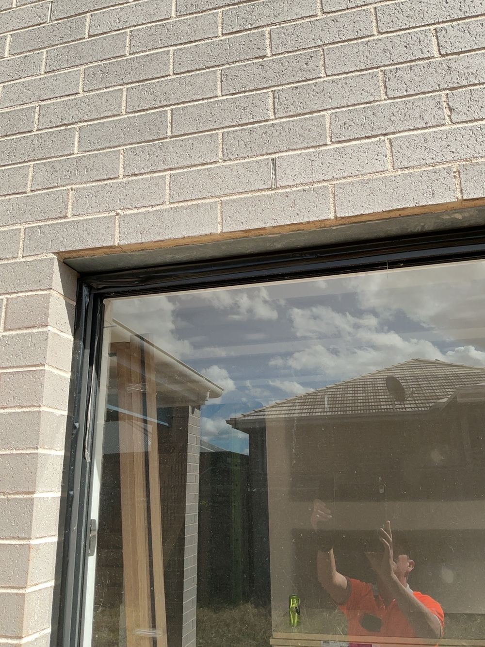 Window head and side infills left incomplete, Cobbitty