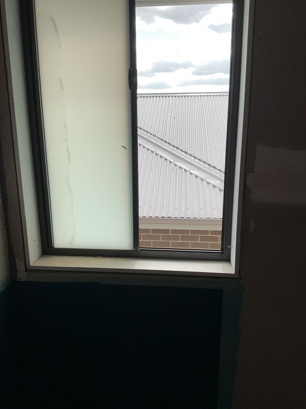 Window opening restriction missing, found during a fixing stage inspection in Cobbitty