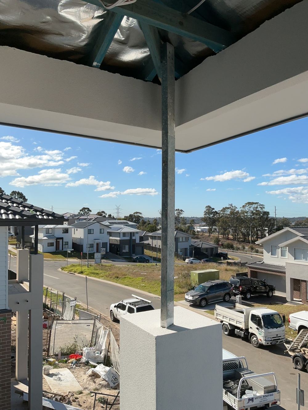 A balcony roof left standing on a builder's prop