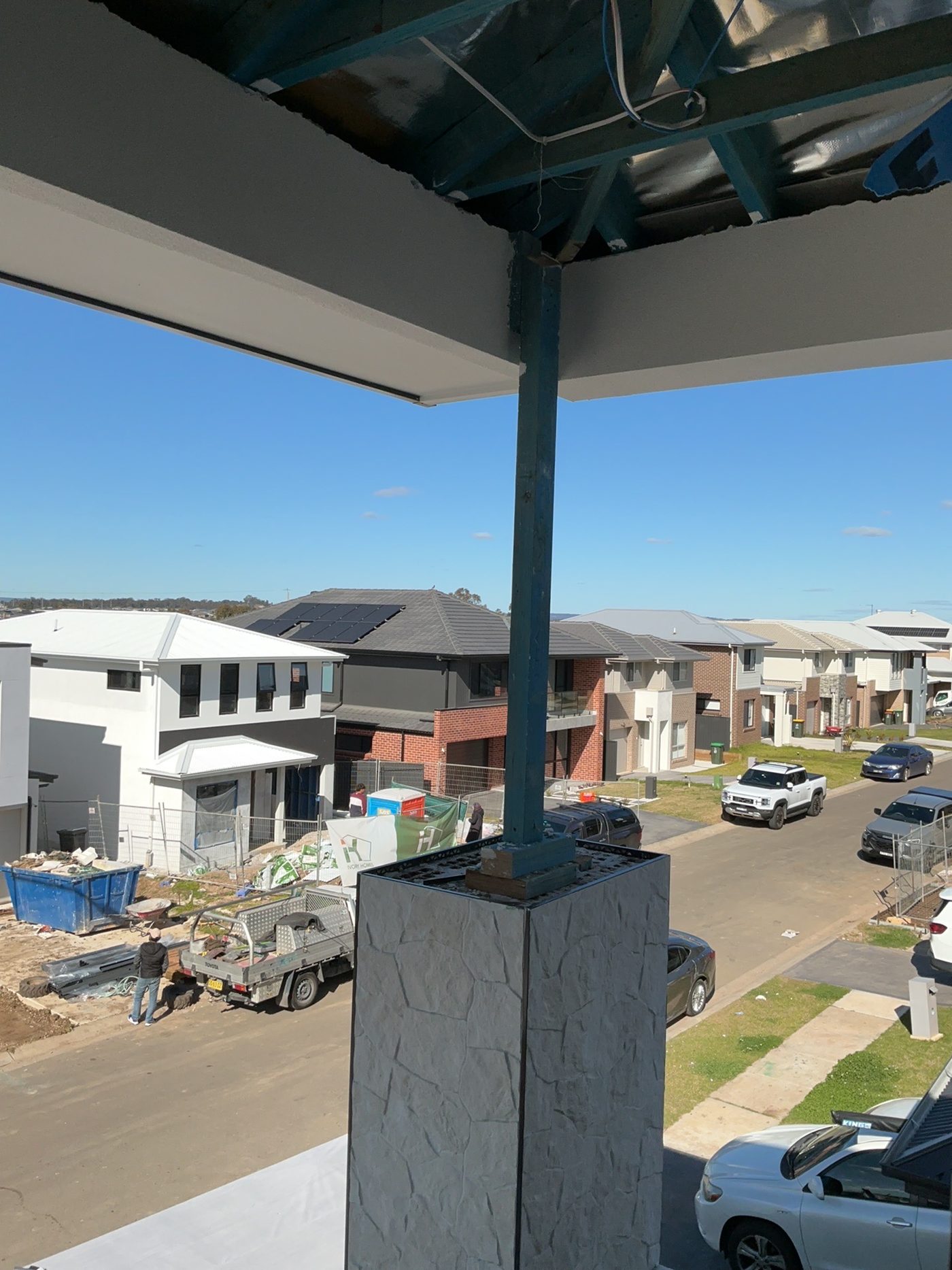 Balcony roof on a temporary post, found during a lock-up inspection in Cobbitty
