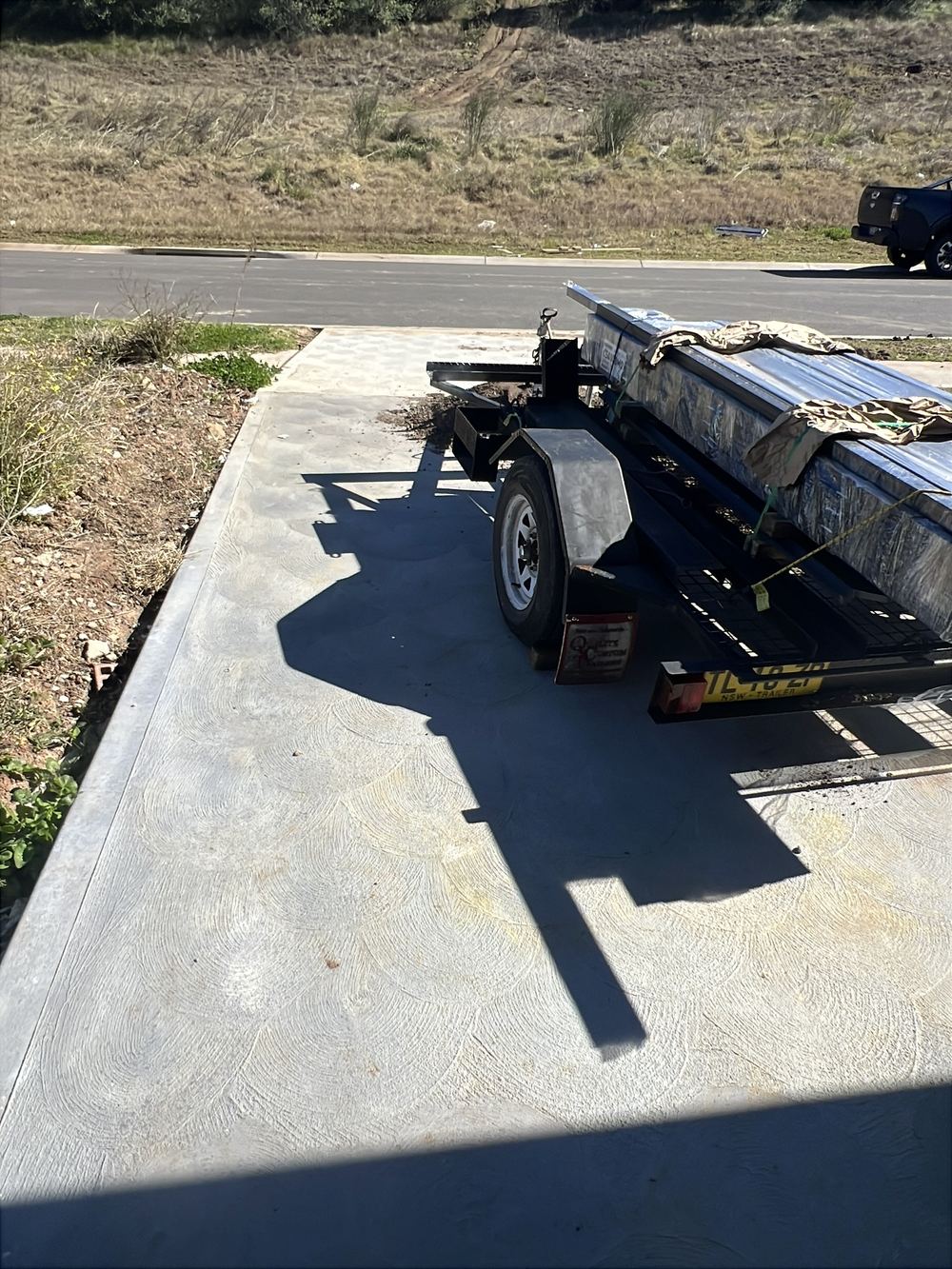 A driveway poured without saw cuts or isolation joints